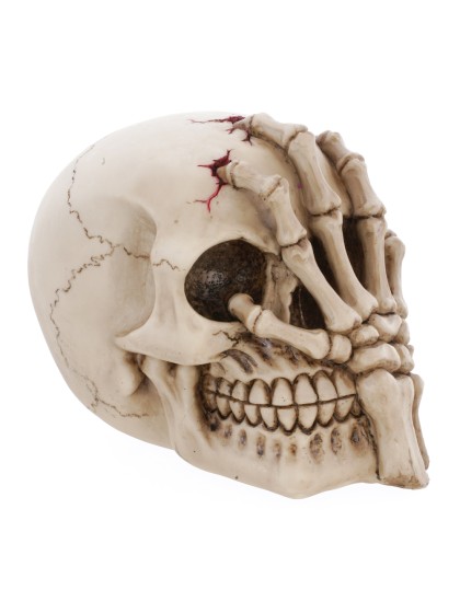 RESIN SKULL WITH HAND 16CM X 10CM X 12CM