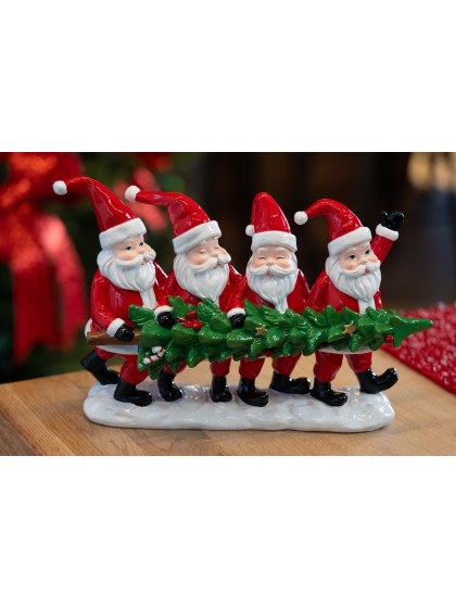 RESIN TABLE CENTER 4 SANTAS HOLDING A TREE 29CM X 9CM X 19.5CM