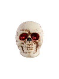 TETE DE MORT PLASTIQUE AVEC LED YEUX ROUGES 11CM X 16CM X 13CM